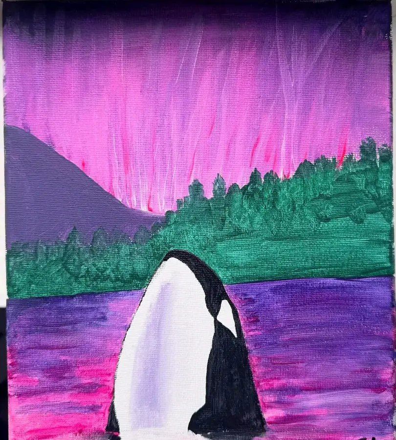 Unfinished painting of an orca surfacing below a pink aurora